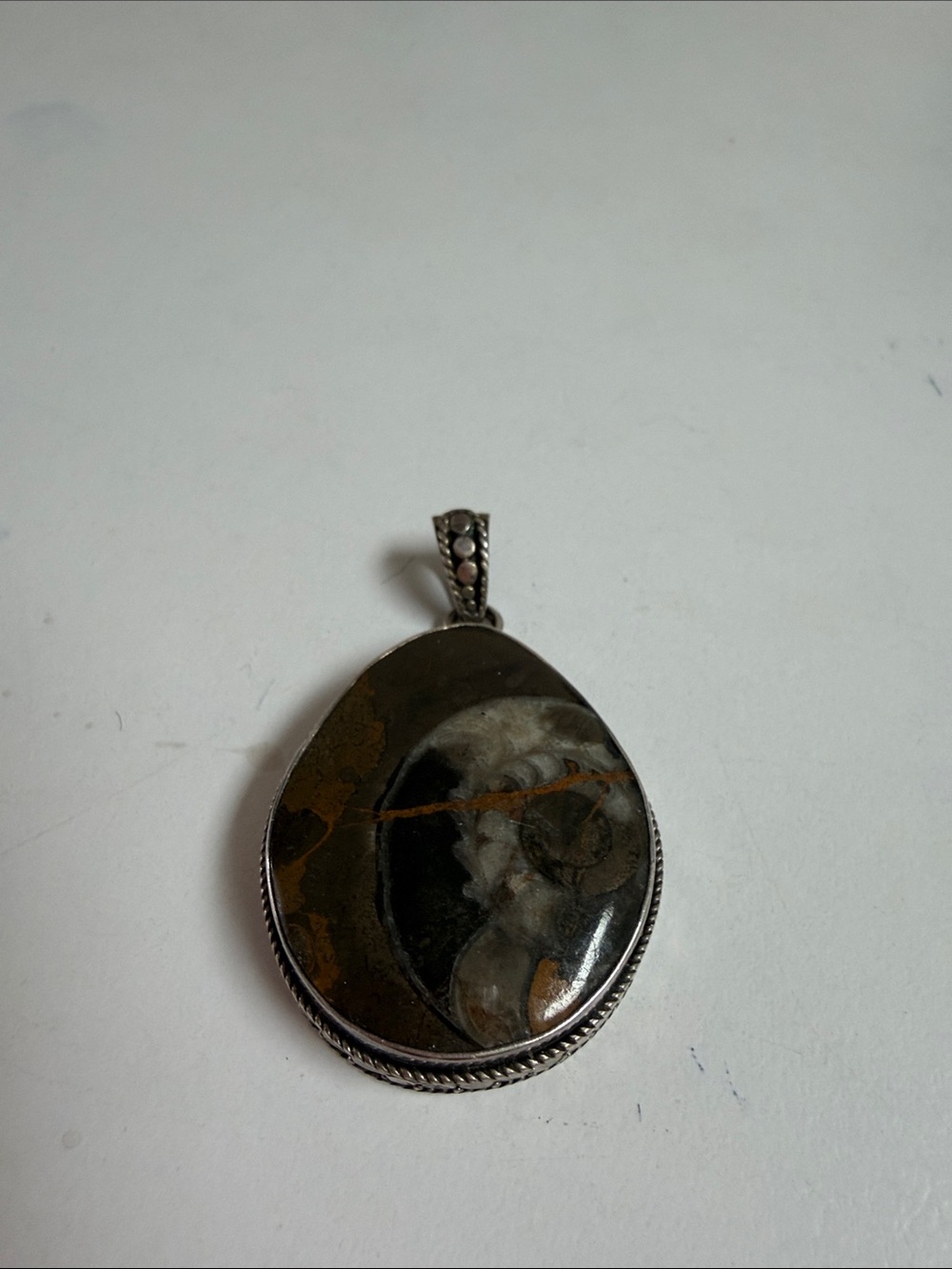 Source Unknown Black and Brown Jasper Oval Pendant with Silver Setting